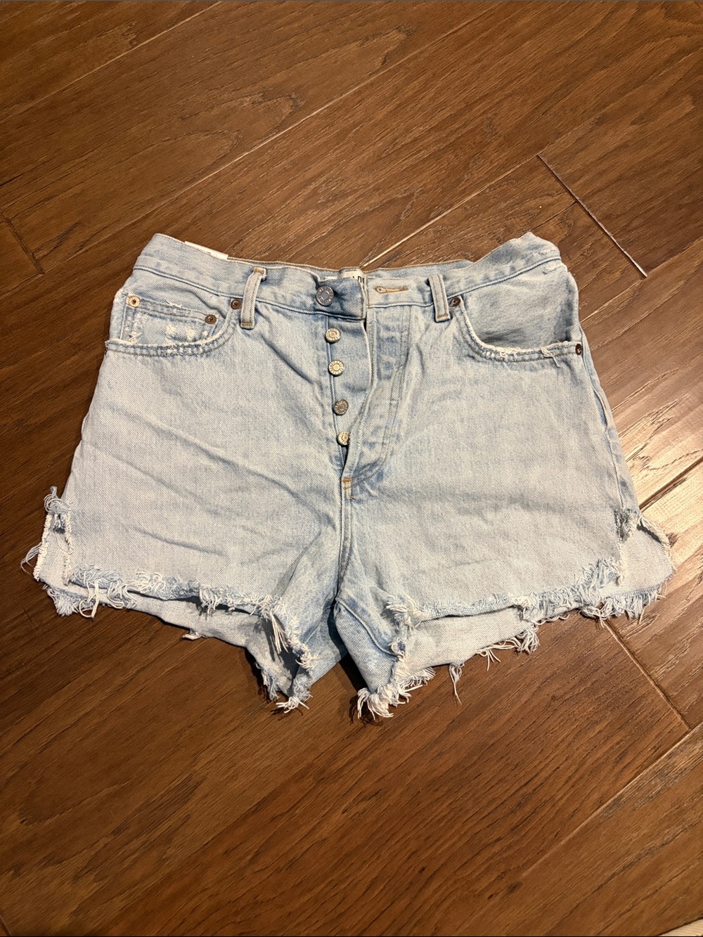 Agolde Light Blue Distressed Button-Fly Denim Shorts